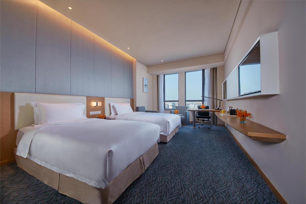 Holiday Inn Express Nantong Textile City By Ihg Esterno foto