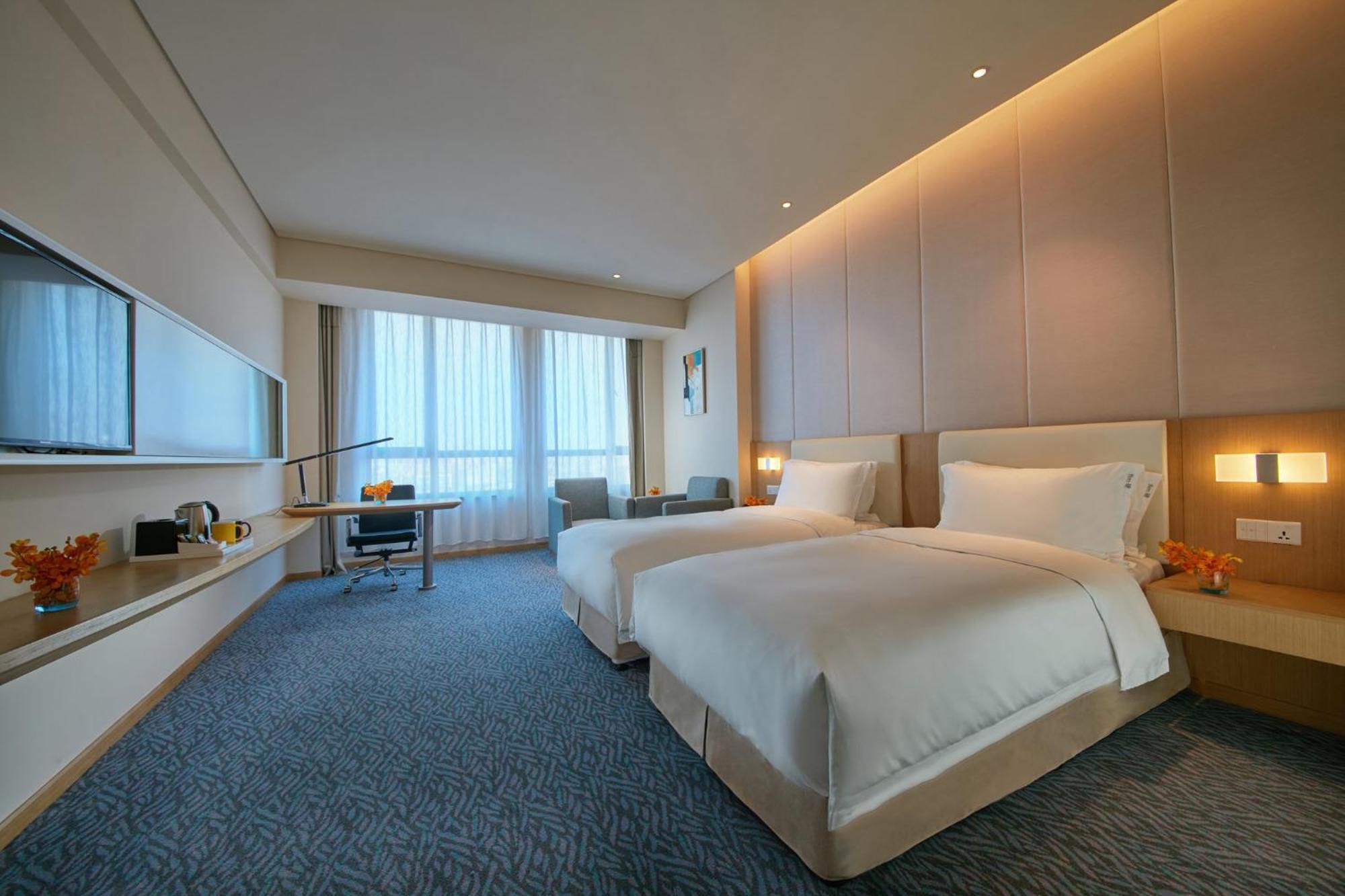 Holiday Inn Express Nantong Textile City By Ihg Esterno foto