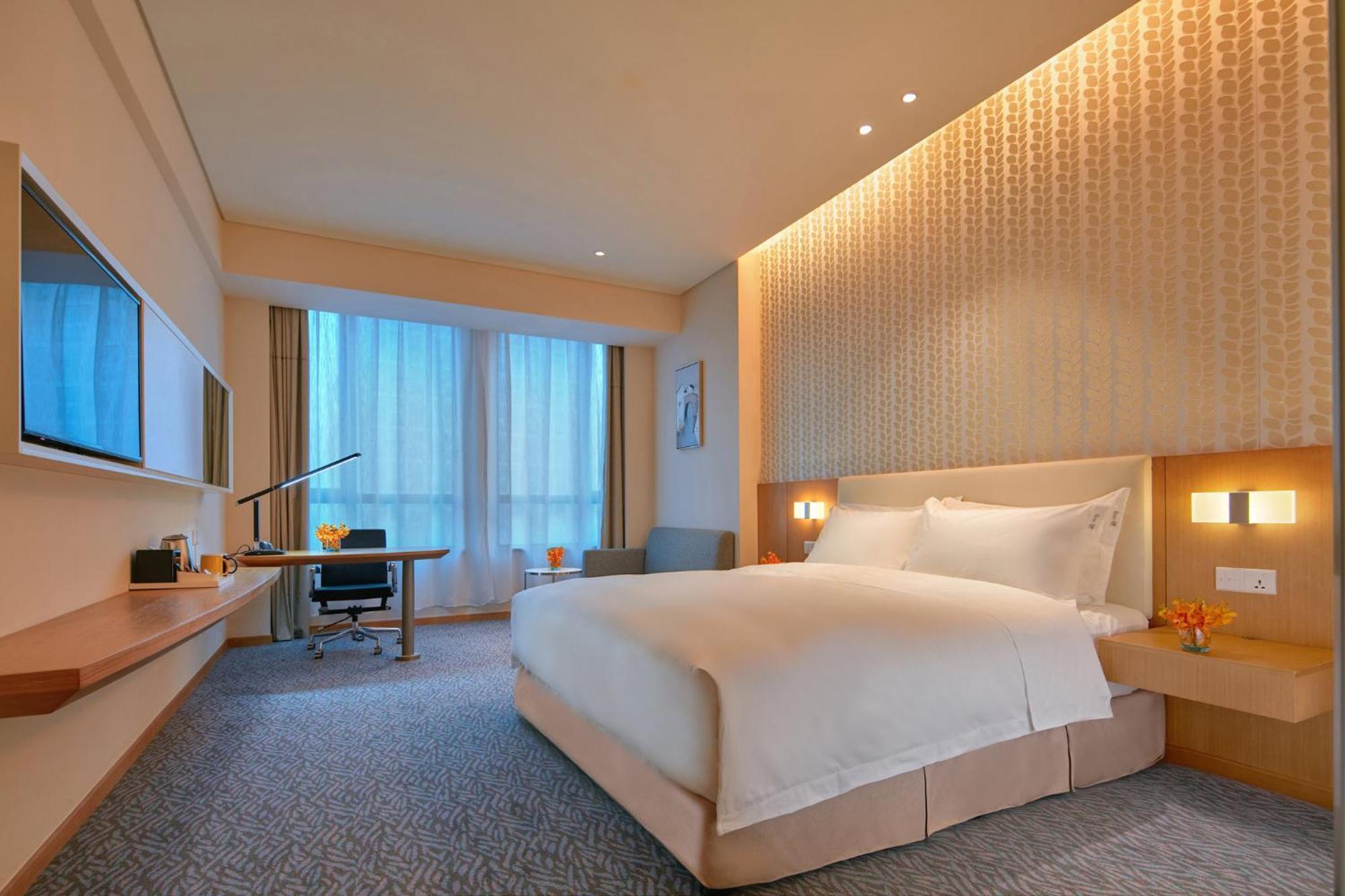 Holiday Inn Express Nantong Textile City By Ihg Esterno foto