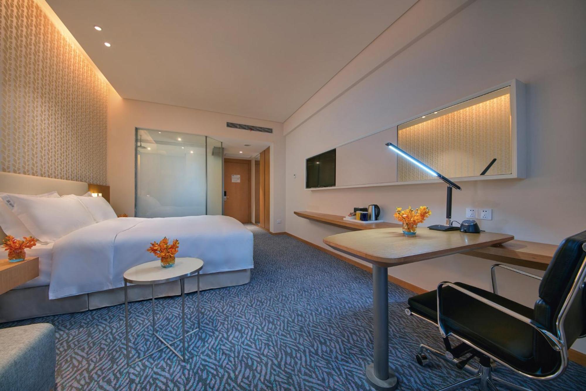 Holiday Inn Express Nantong Textile City By Ihg Esterno foto